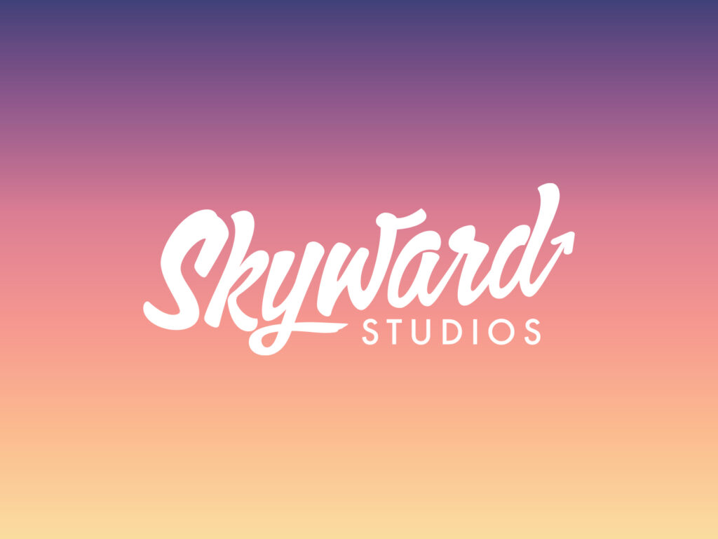 Logo for Skyward Studios, Christiansburg, VA, on a sunset-colored background